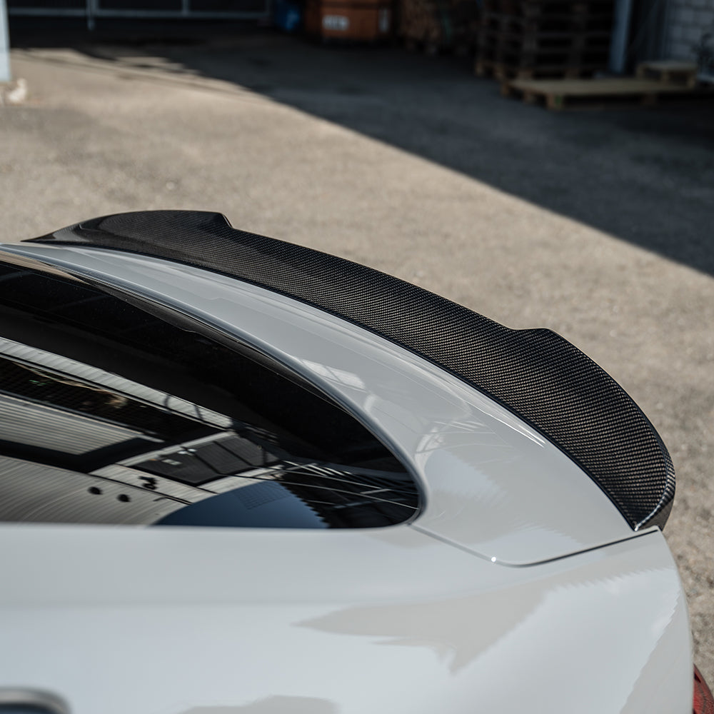 Full view of a CT Carbon Audi RS5 B9.5 Sportback 2020-2024 carbon fiber kit installed on the car, showcasing sleek, high-quality carbon fiber accents.