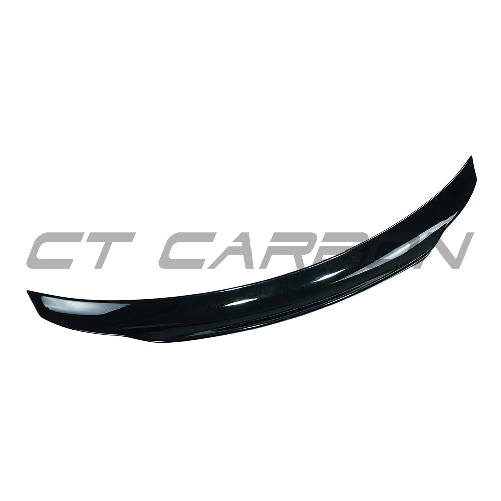 Mercedes C-Class W206 2022+ CT Carbon gloss black rear spoiler V1 on car, showcasing sleek aerodynamic design.
