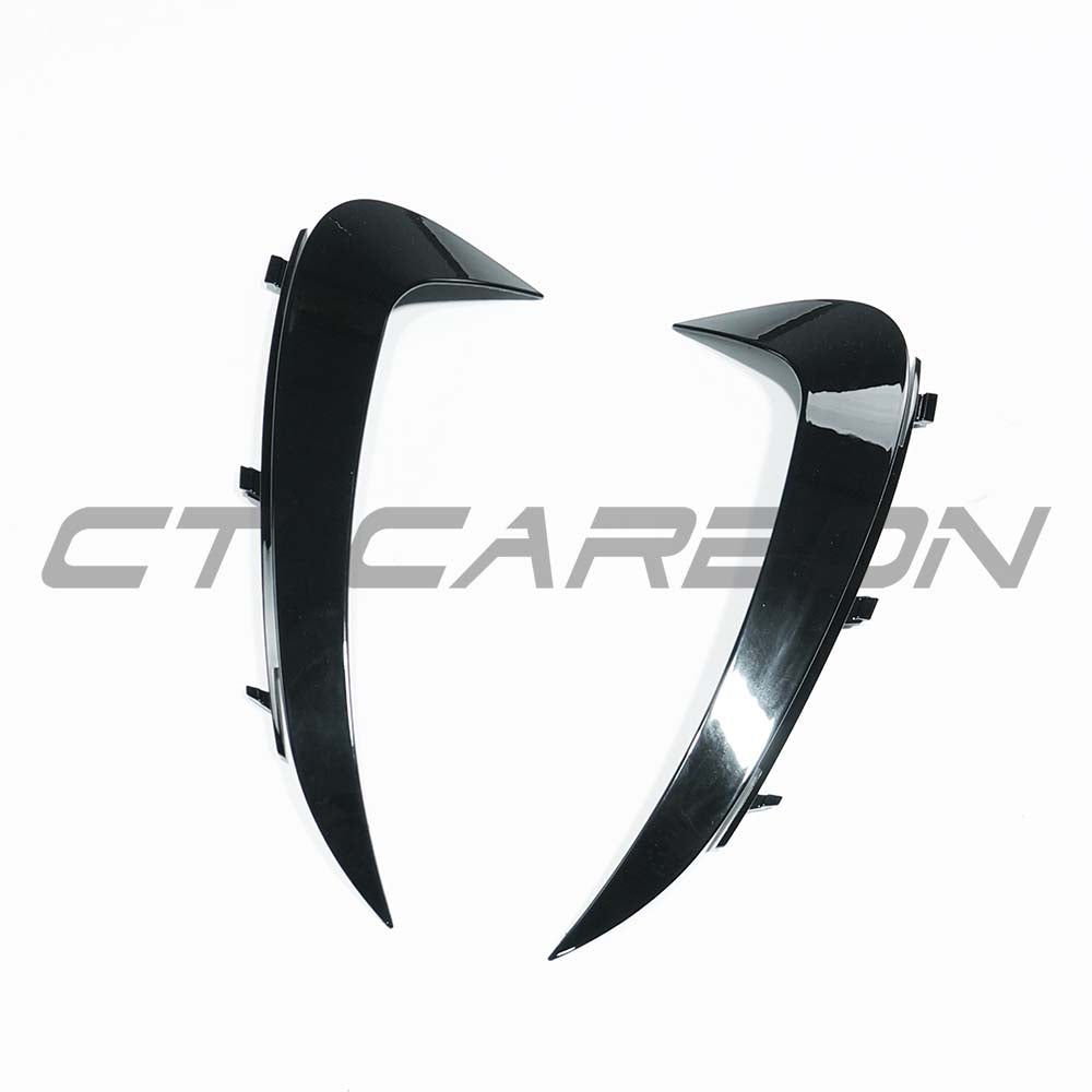 Gloss black rear bumper trim for Mercedes C-Class W206 2021-2023 by CT Carbon, accessory for enhanced rear styling.