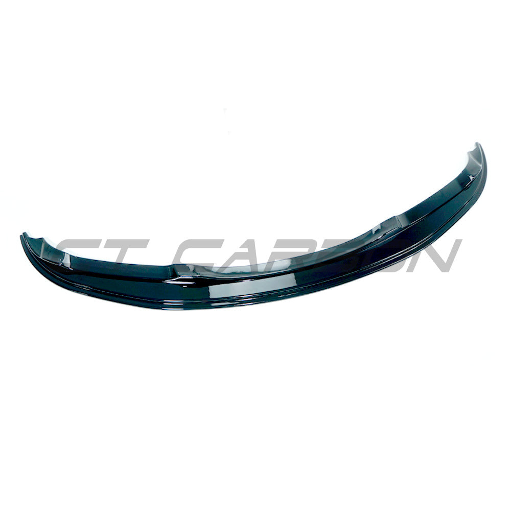 BMW E90/E91 3 Series M-Sport gloss black front splitter by CT Carbon, V6 design, installed on the vehicle's front bumper.