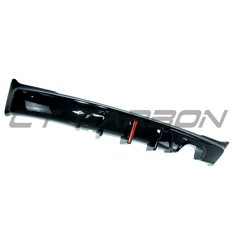 Gloss black LED twin left diffuser for BMW F22/F23 2 Series 2014-2020 by CT Carbon, shown on a car exterior.