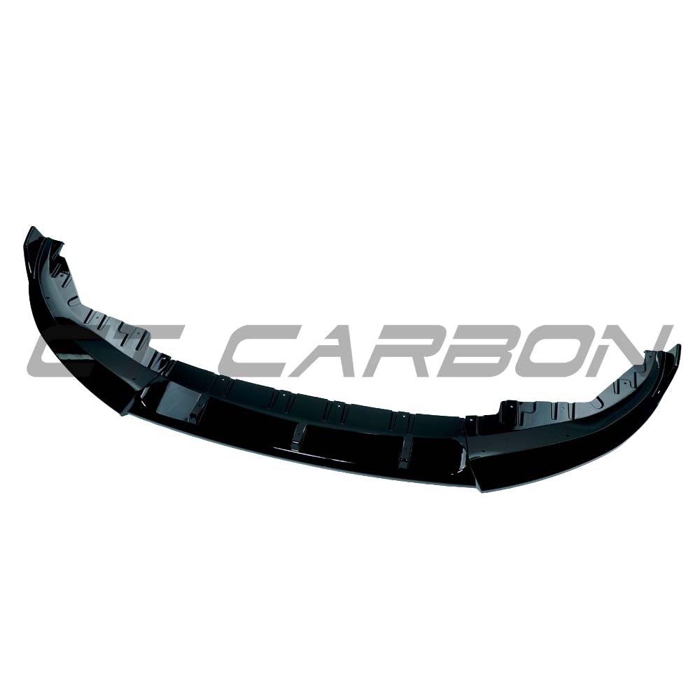 CT Carbon BMW G26 4 Series 2021+ gloss black 3-piece splitter installed on front bumper, enhancing sporty look.