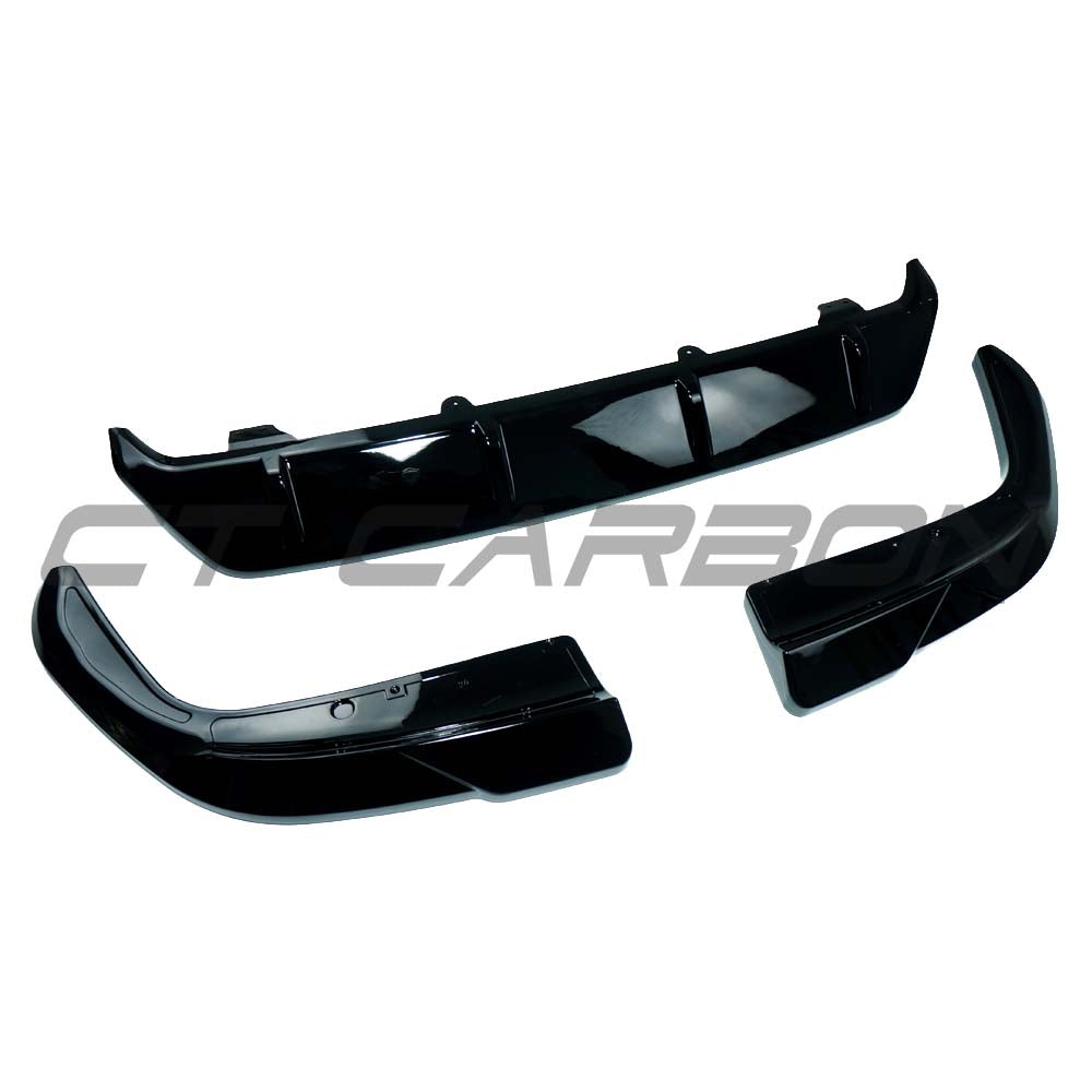 BMW G06 X6 2019-2023 CT Carbon diffuser and corner kit installed, showcasing sleek black carbon fiber design on vehicle rear.