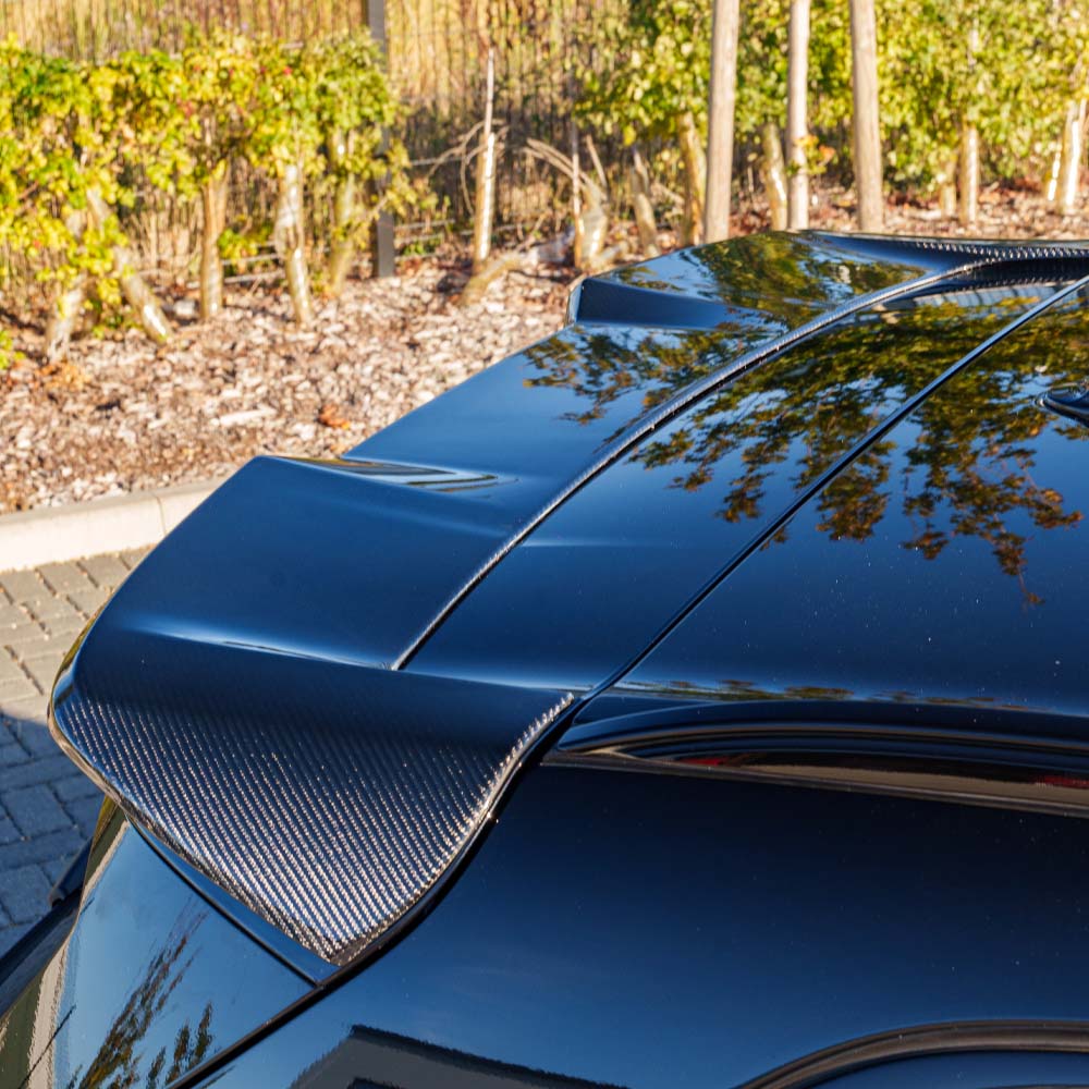 BMW G05 X5 LCI 2023 full carbon fibre kit by CT Carbon, showing detailed carbon fibre components on the vehicle.