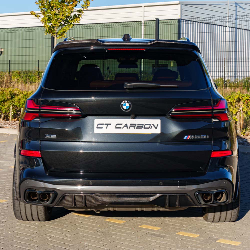 BMW G05 X5 LCI 2023 full carbon fiber kit by CT Carbon, showing sleek, lightweight carbon fiber components on the vehicle.