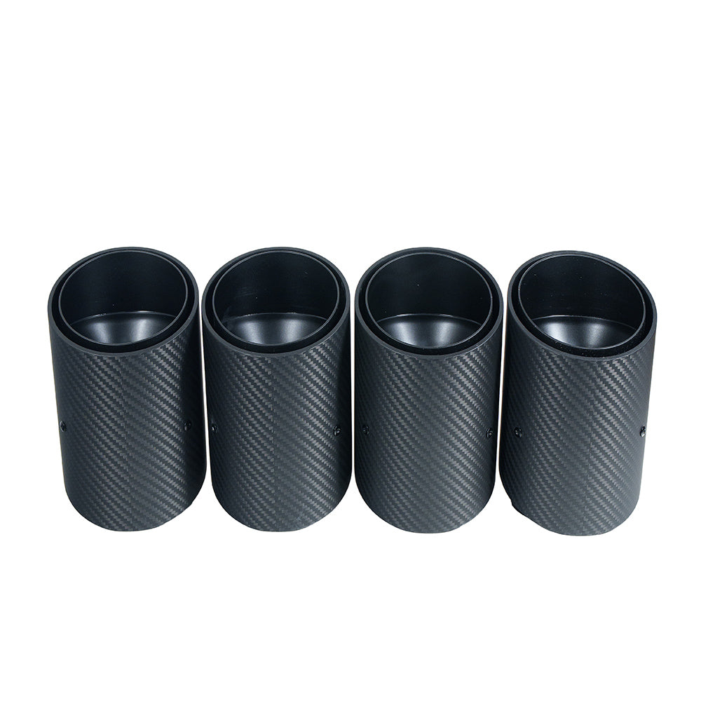 BMW G90 G99 M5 Touring 2024 carbon fiber slash cut exhaust tips in matte black, designed for CT Carbon exhaust systems.