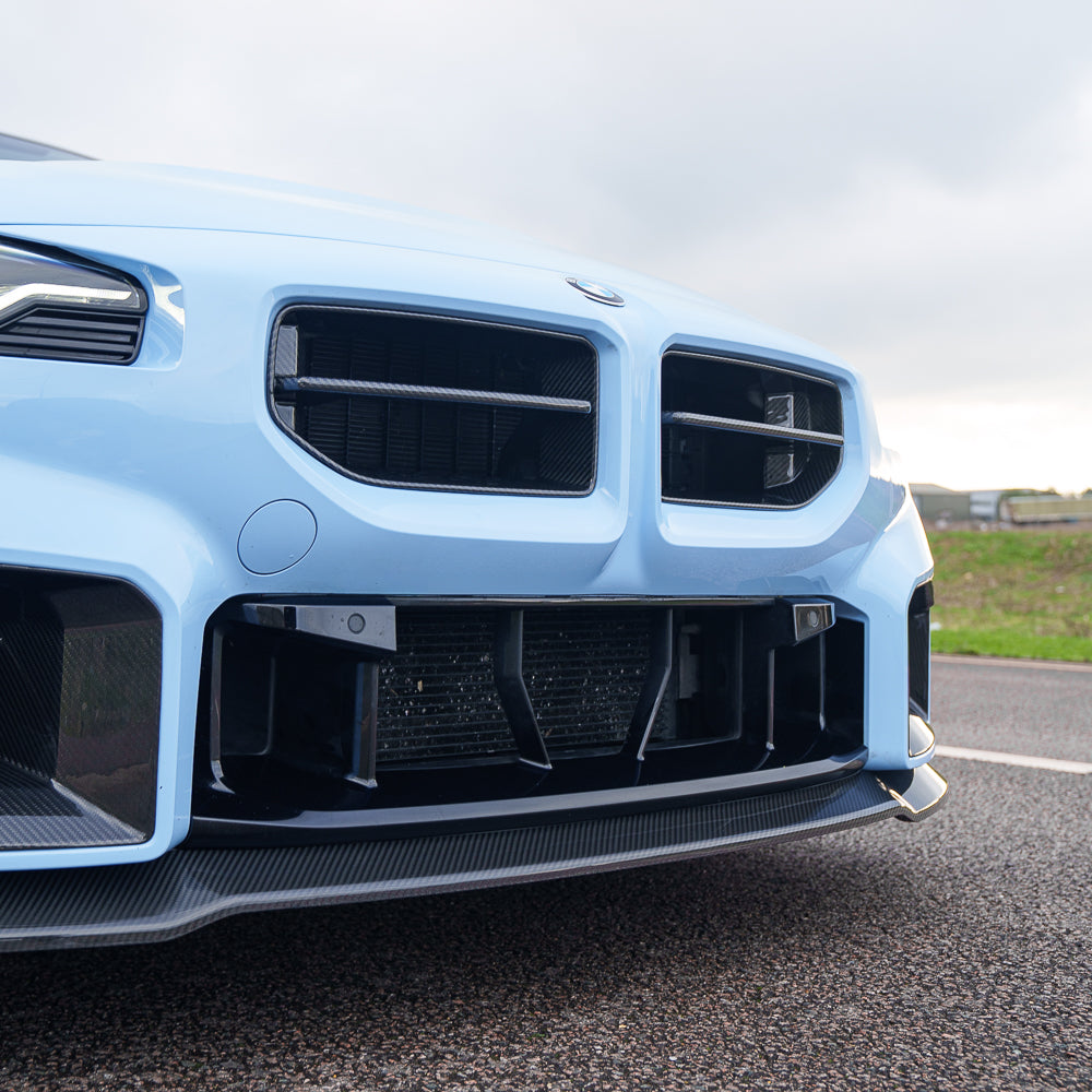 BMW G87 M2 carbon fibre front grille by CT Carbon, showcasing sleek, high-quality automotive accessories with a textured carbon finish.