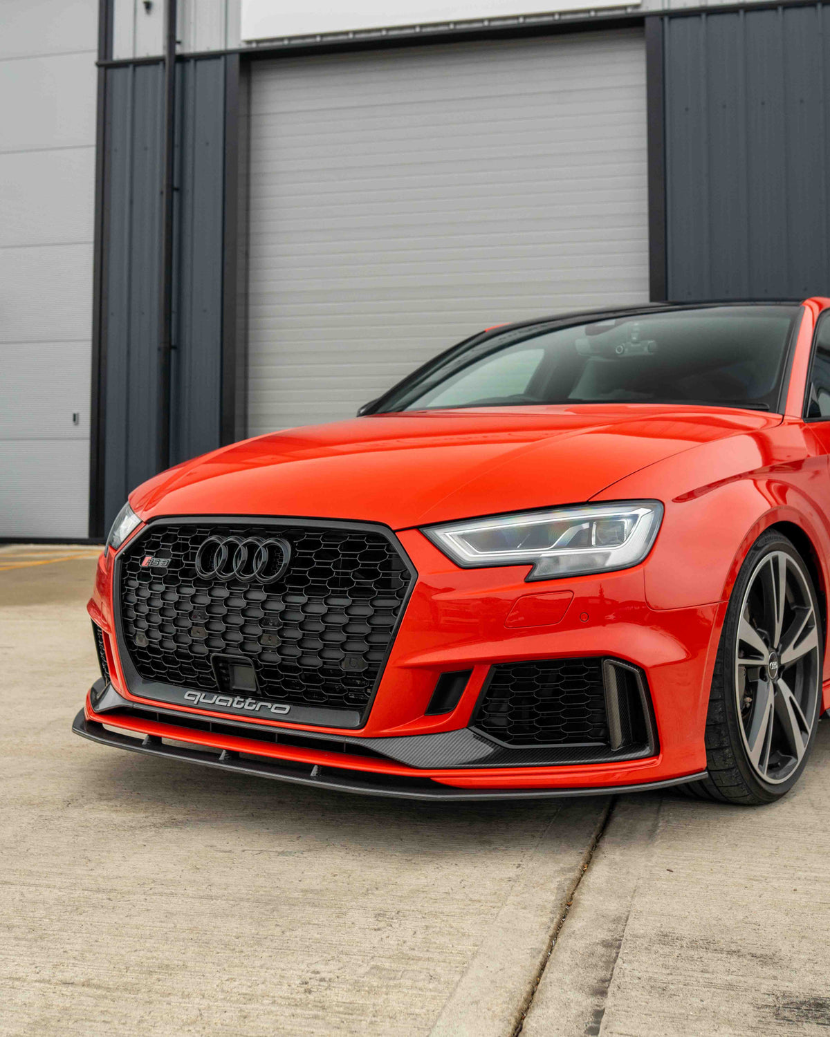 Audi RS3 8V facelift carbon fibre bumper trim by CT Carbon, close-up of sleek, lightweight automotive accessory.