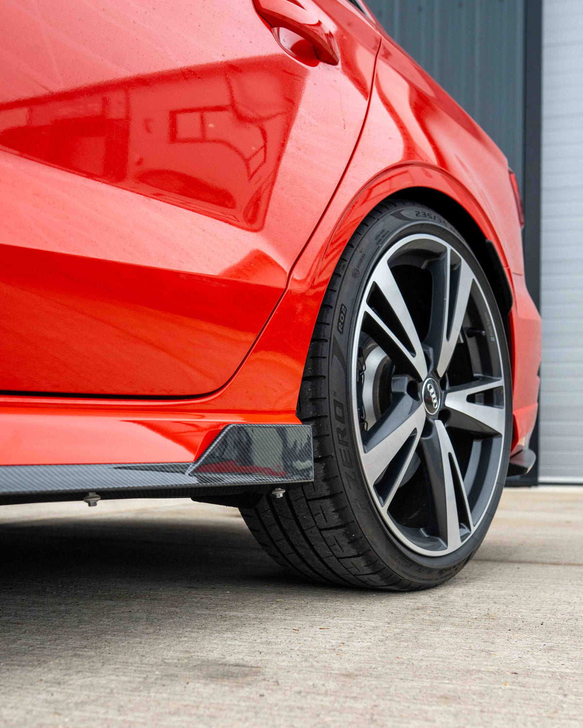 Carbon fiber side skirts for Audi A3/S3/RS3 8V saloon by CT Carbon, featuring sleek V2 design and aerodynamic styling.