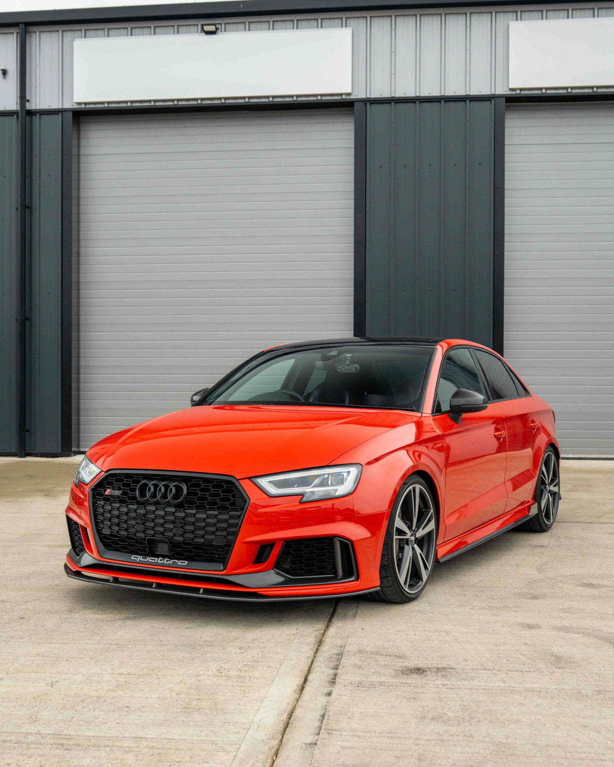 Audi RS3 8V facelift carbon fibre bumper trim accessory by CT Carbon, showing close-up of sleek, lightweight, textured carbon fibre surface.