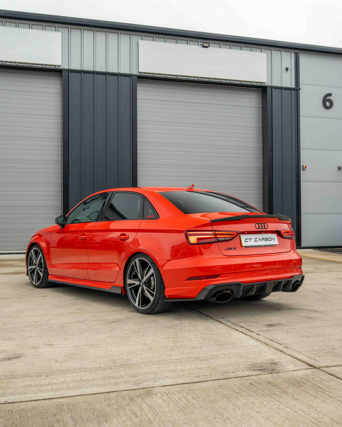 Carbon fiber spoiler for Audi A3 S3 RS3 8V saloon by CT Carbon, shown on a sleek car with detailed close-up view.