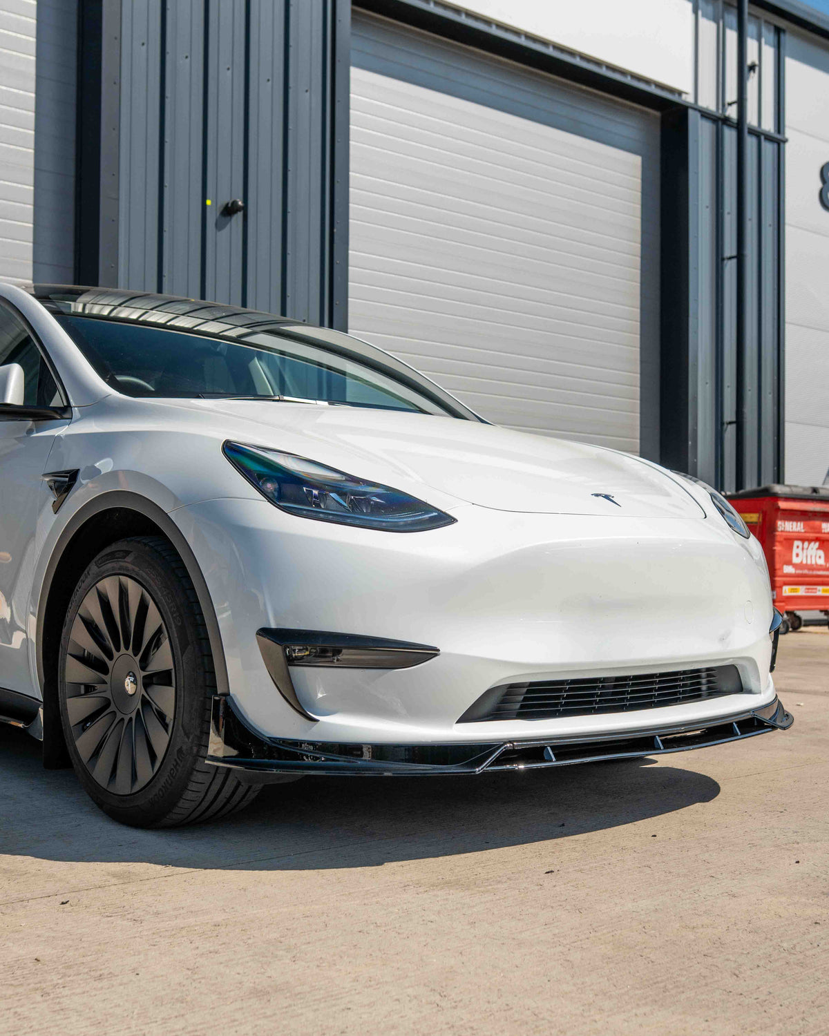 Full gloss black car kit by CT Carbon for Tesla Model Y MK1 2020-2025, shown in the image.