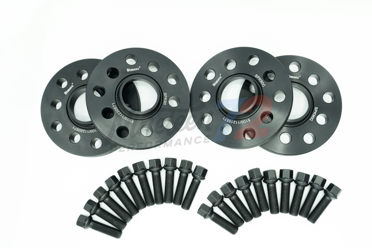 Bimecc STANCE KIT MMX Performance wheel spacers for BMW M135i and M140i, showing installed spacers on wheel assembly.