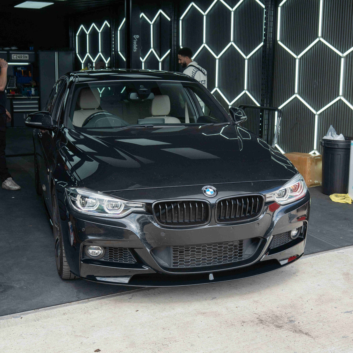 BMW 3 Series F30 F31 GLOSS BLACK splitter by CT Carbon, close-up view of the sleek aerodynamic car splitter.