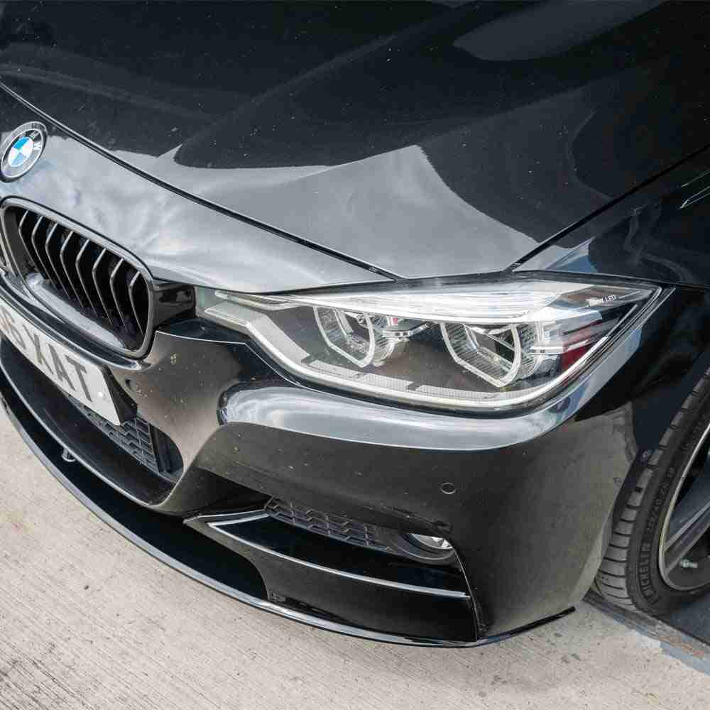 BMW 3 Series F30 F31 CT Carbon gloss black splitter V1, close-up view showing sleek aerodynamic design and high-quality finish.