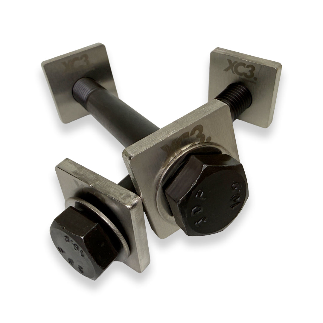 BMW M3 E9X E92 camber lockout shims by XC3 Engineering for suspension and alignment adjustment, shown in the image.