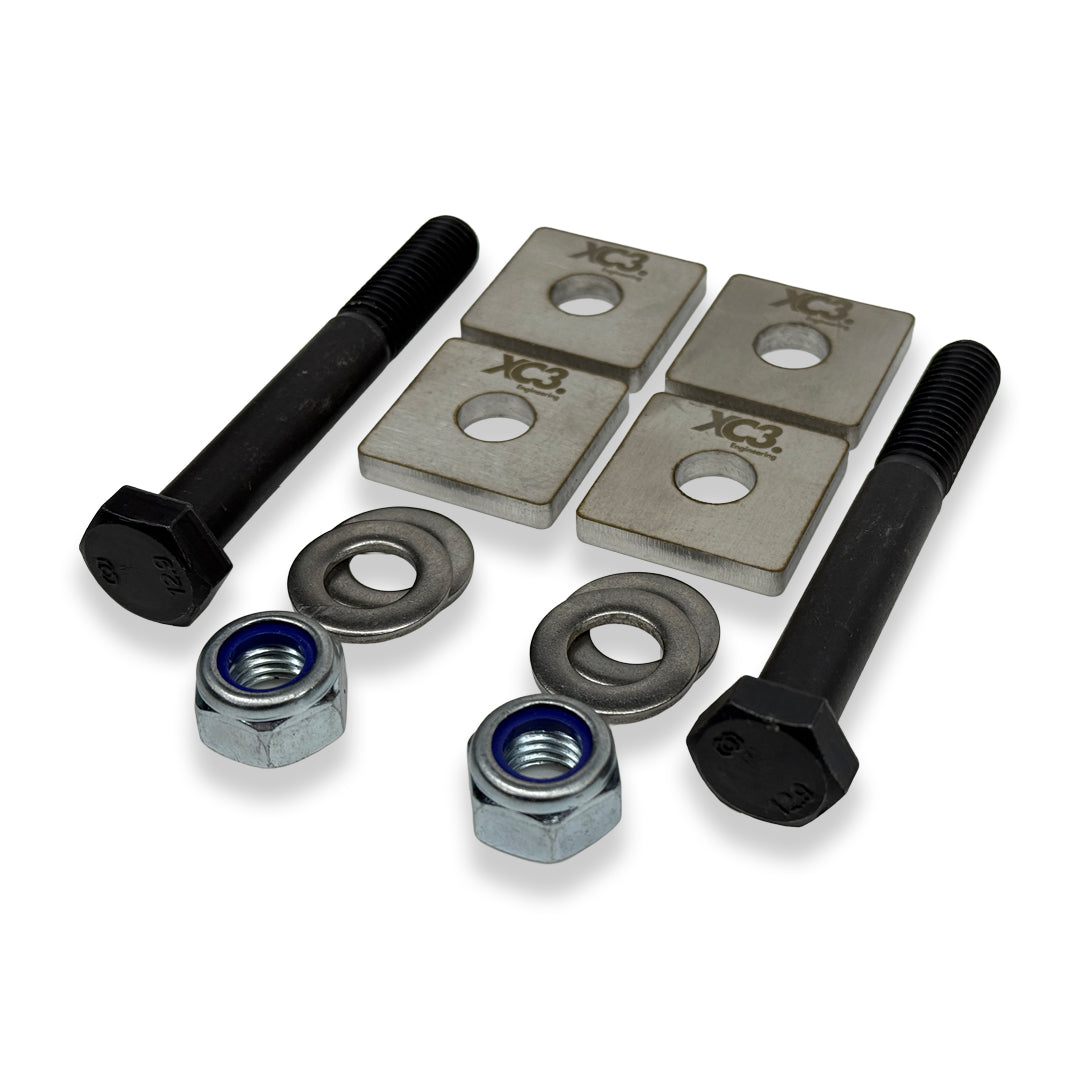 BMW M340i M440i F3X rear toe lockout shims from XC3 Engineering, showing metal suspension and alignment components.