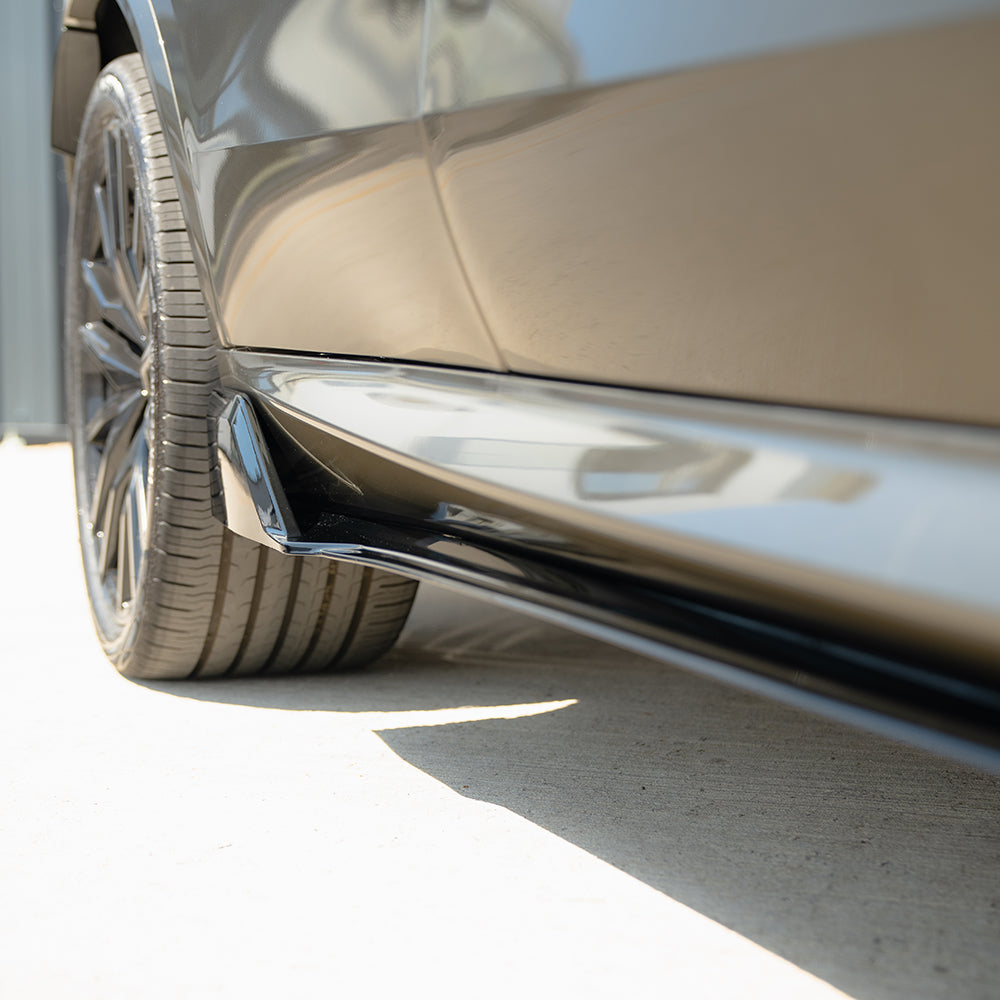 BMW G05 X5 LCI full gloss black kit by CT Carbon, showing close-up of sleek, shiny black exterior components.