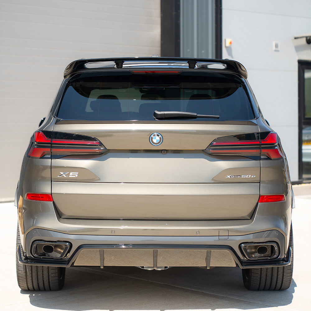 BMW G05 X5 LCI full gloss black kit by CT Carbon, featuring sleek black exterior accessories for the SUV.