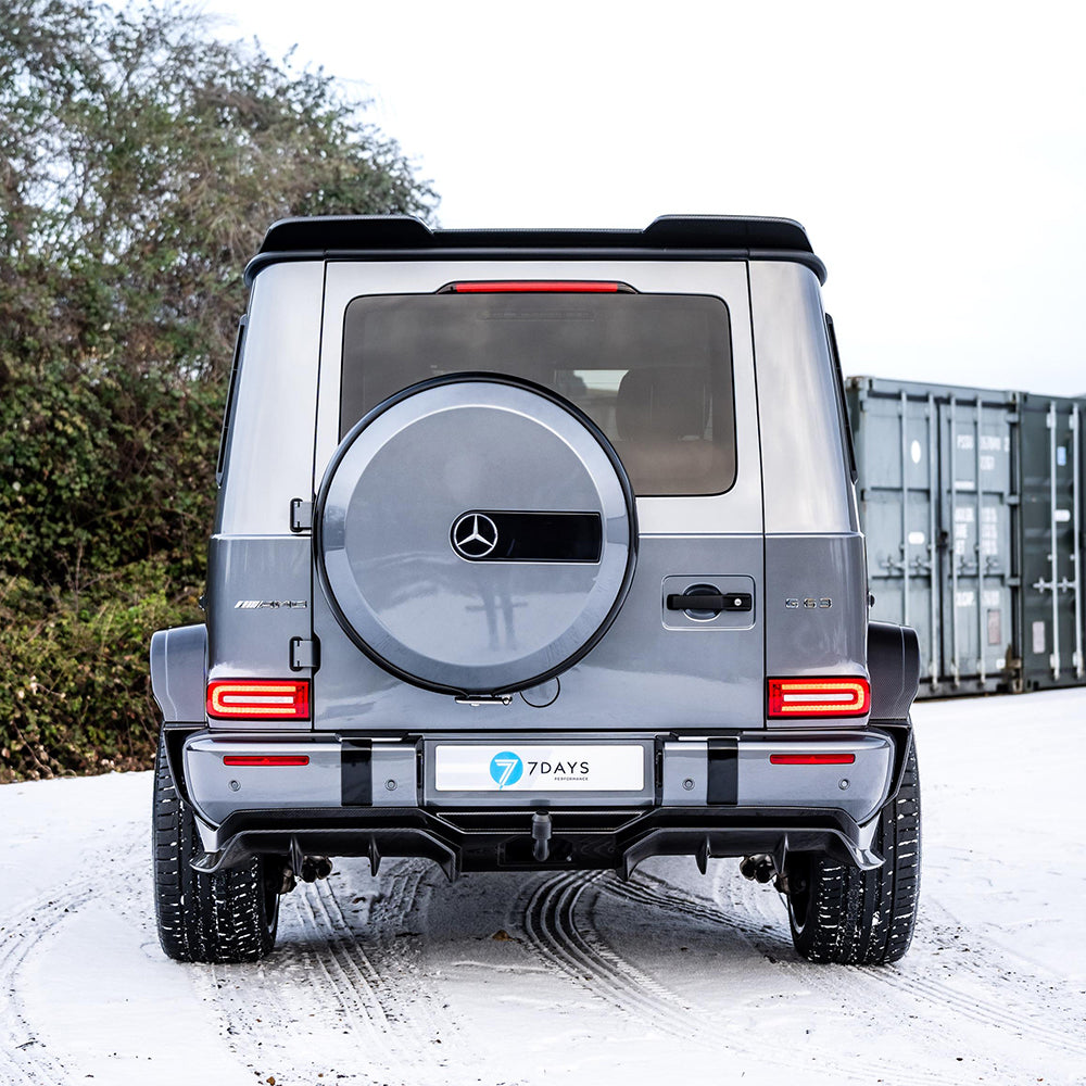 Mercedes-Benz G63 W463 carbon fiber wide arch kit by CT Carbon, showing sleek, full carbon fiber fender extensions on the vehicle.