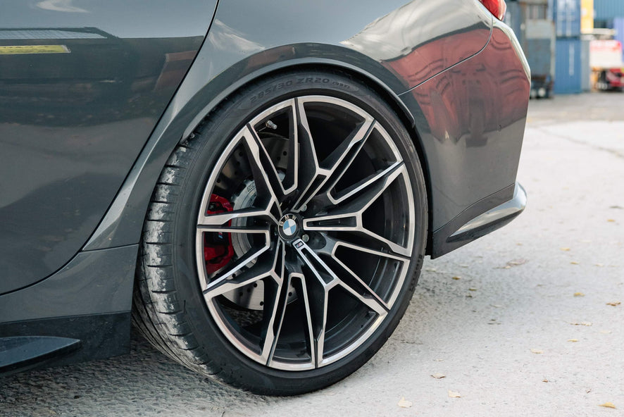 BIMECC stance kit for G80 M3 X-Drive with wheel spacers and springs, enhancing vehicle stance and performance.