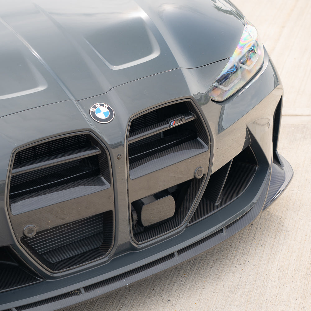 BMW M3 M4 G80 G81 G82 G83 Carbon Fibre Grille by CT Carbon with ACC, showcasing the sleek, textured carbon fibre design.