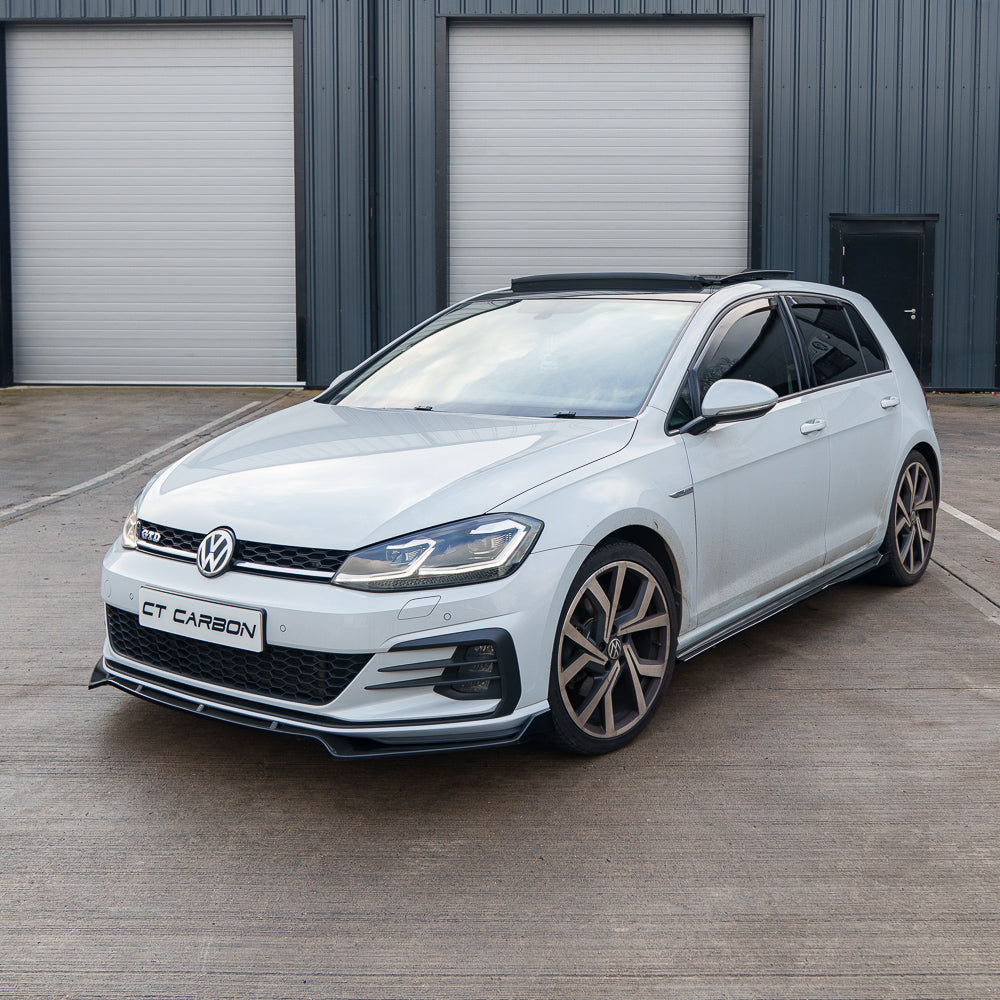 Gloss black splitter for Volkswagen Golf R/GTD/GTI MK7/7.5 2014-2020 by CT Carbon, shown on car's front bumper.