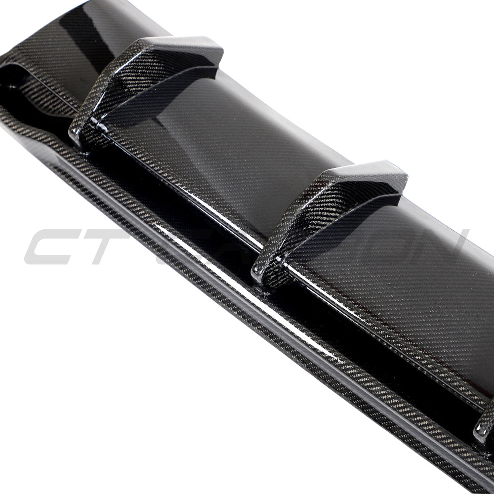 Hyundai i30N carbon fiber diffuser for facelift model, designed by CT Carbon, shown installed on the rear of the vehicle.