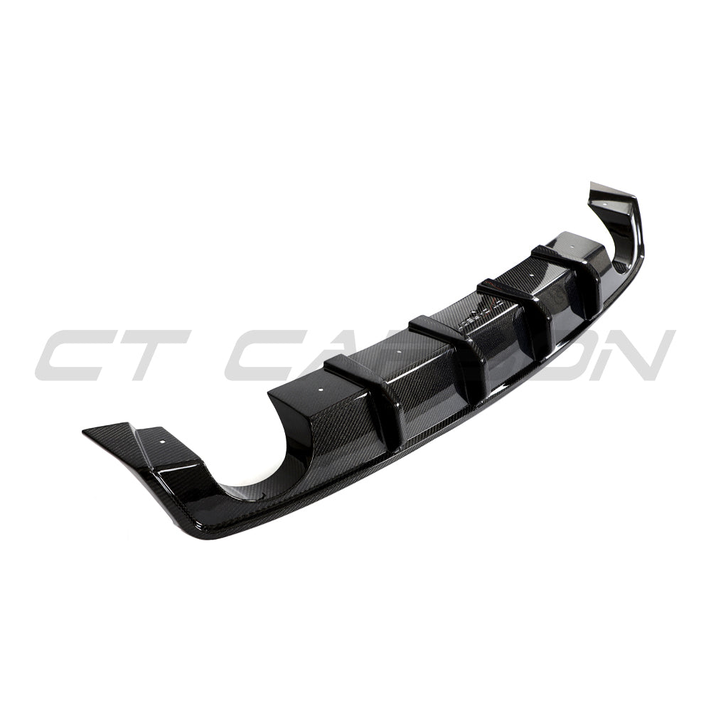 Hyundai i30N carbon fibre diffuser splitter by CT Carbon, pre-facelift model, showcasing sleek carbon fibre finish and aerodynamic design.
