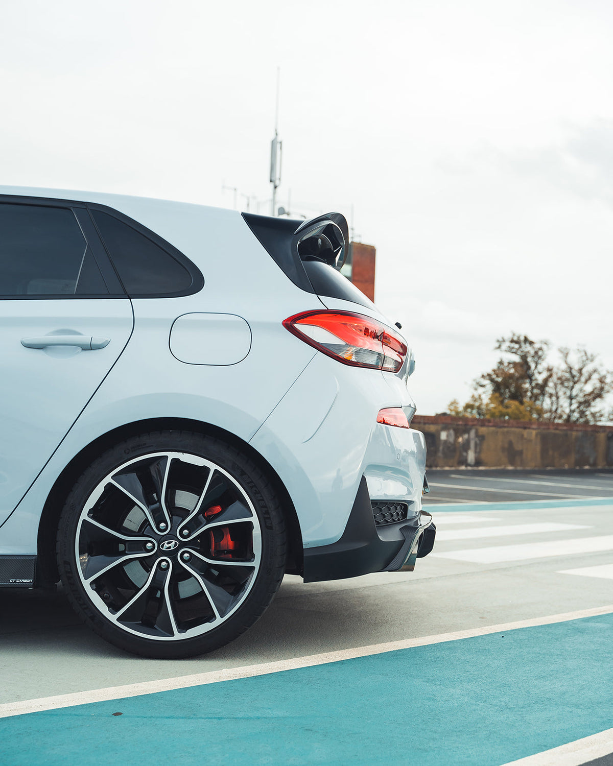 Hyundai i30N carbon fibre diffuser splitter by CT Design, pre-facelift model, showcasing sleek aerodynamic design and high-quality finish.