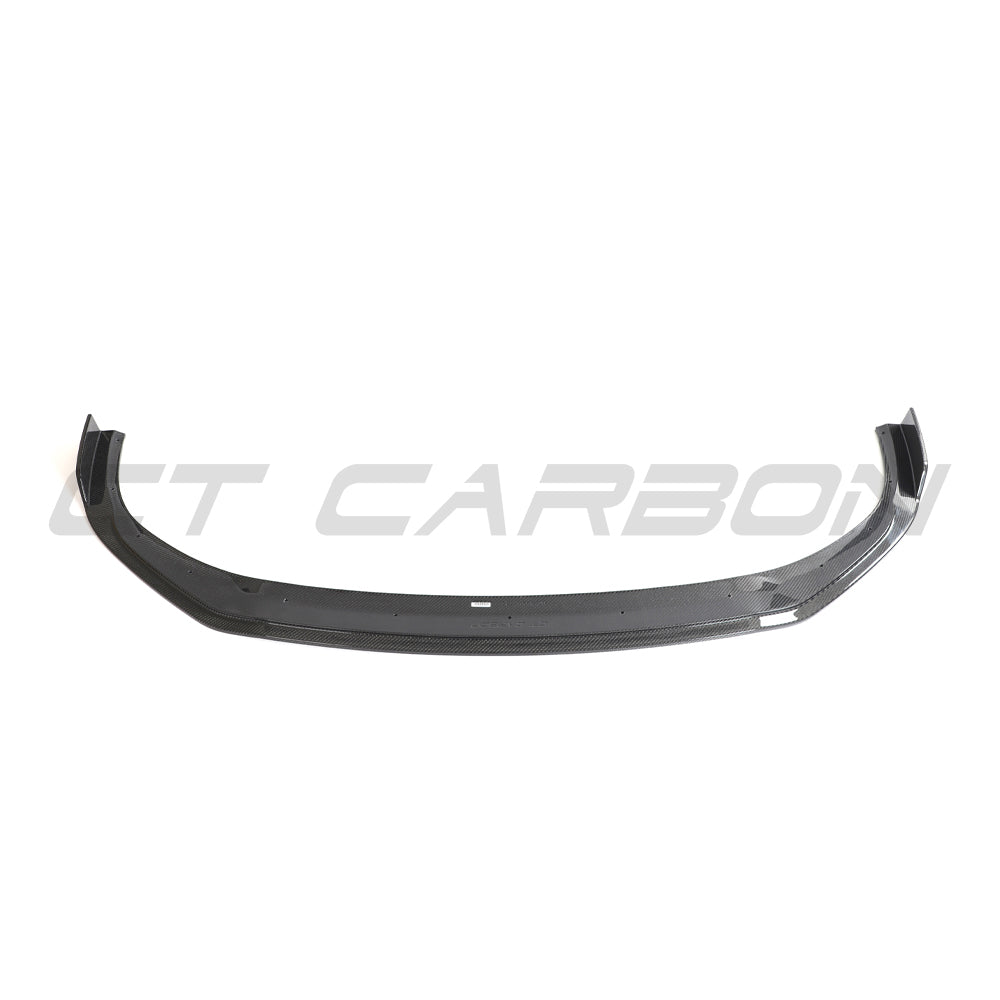 Hyundai i30N front carbon fiber splitter by CT Design, pre-facelift model, shown installed on the car's front bumper.