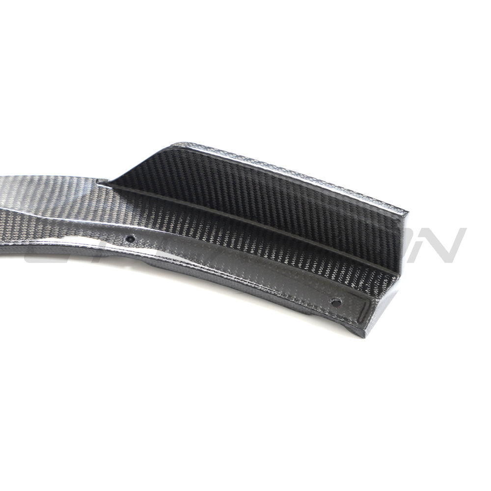 Hyundai i30N front carbon fiber splitter by CT Design, showing the sleek, lightweight aerodynamic component on the car's front bumper.