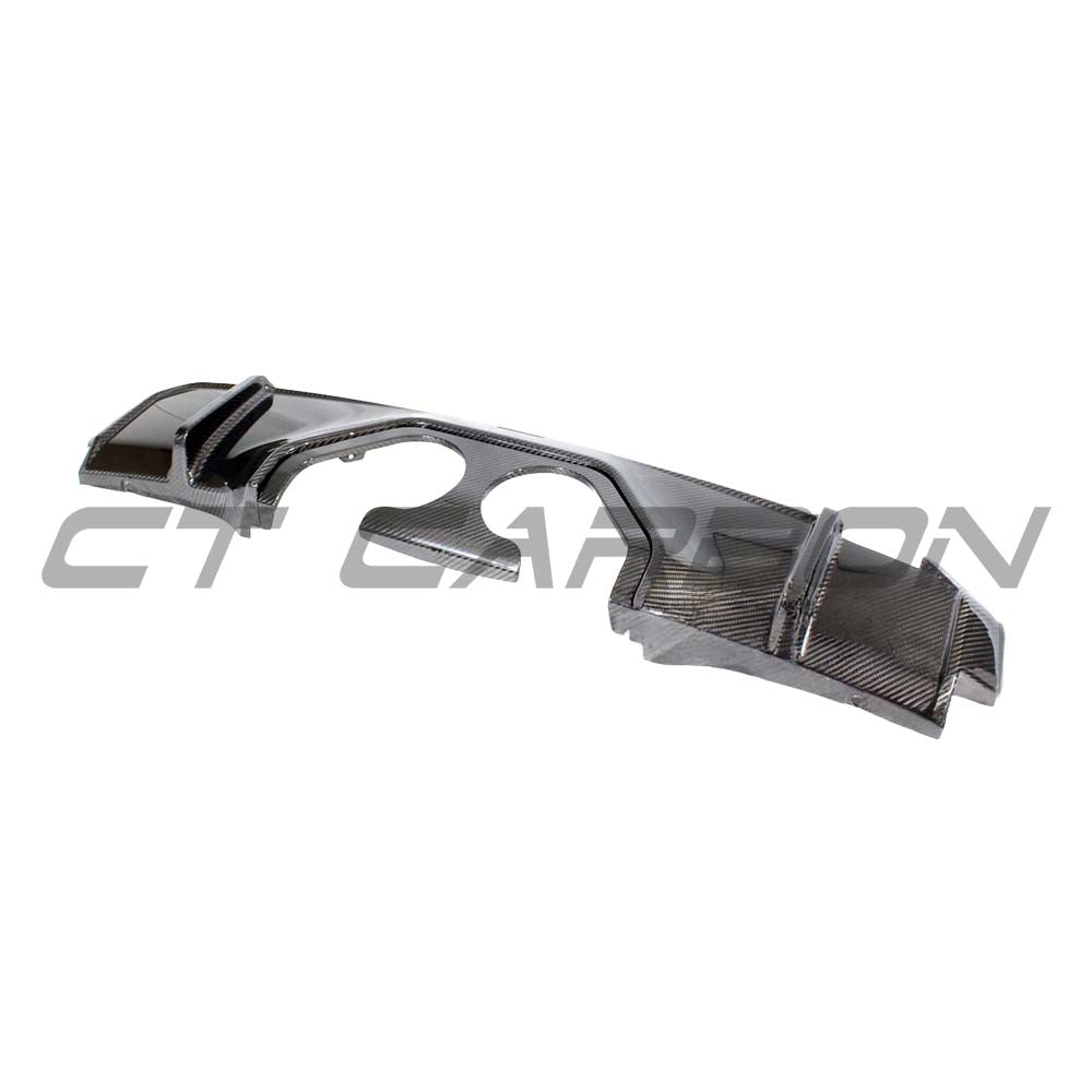 BMW M3 M4 G80 G82 G81 G83 CT Carbon middle outlet diffuser showing sleek black carbon fiber design.