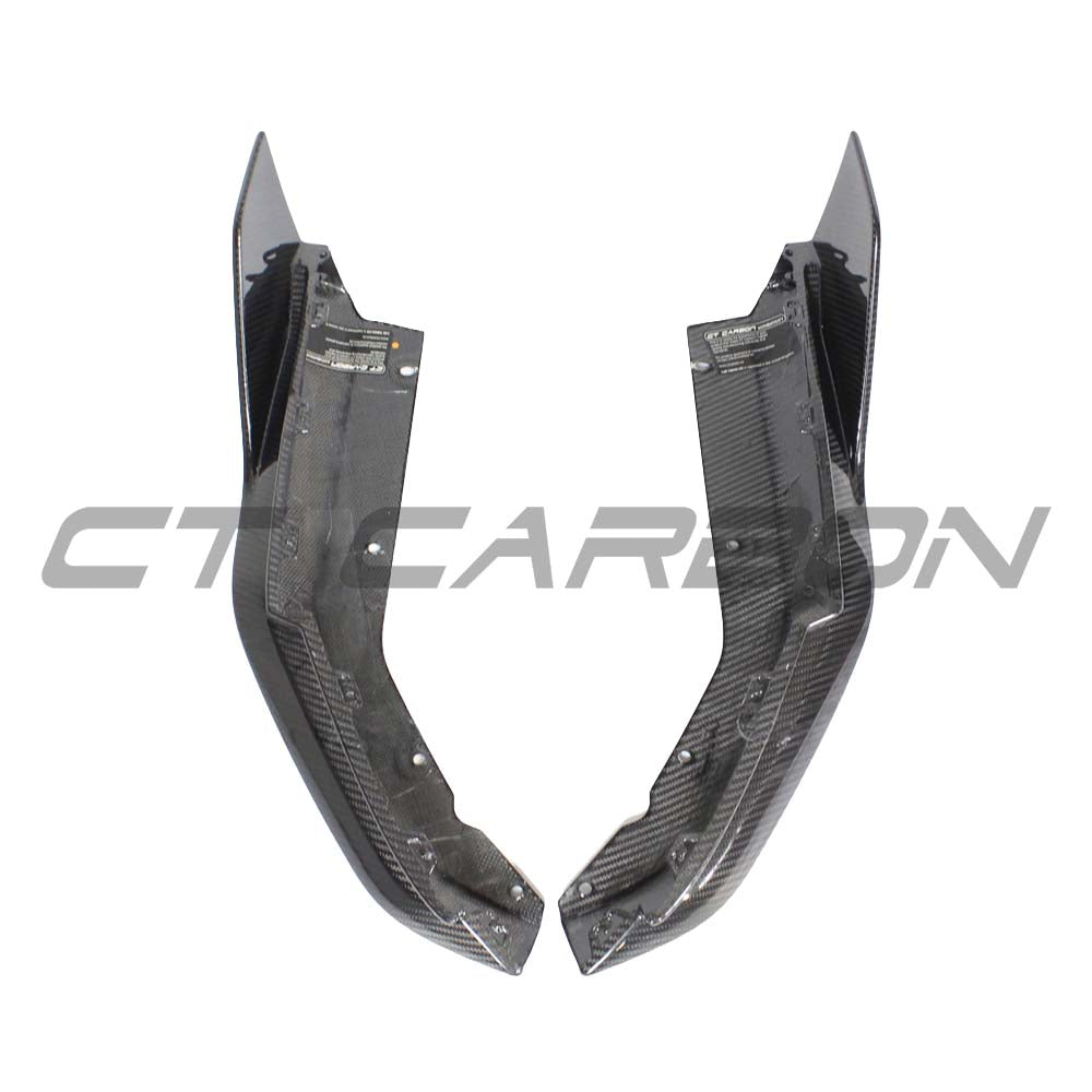 BMW G82 M4 full carbon fibre kit by CT Carbon, showing various carbon fiber body panels and aerodynamic components.