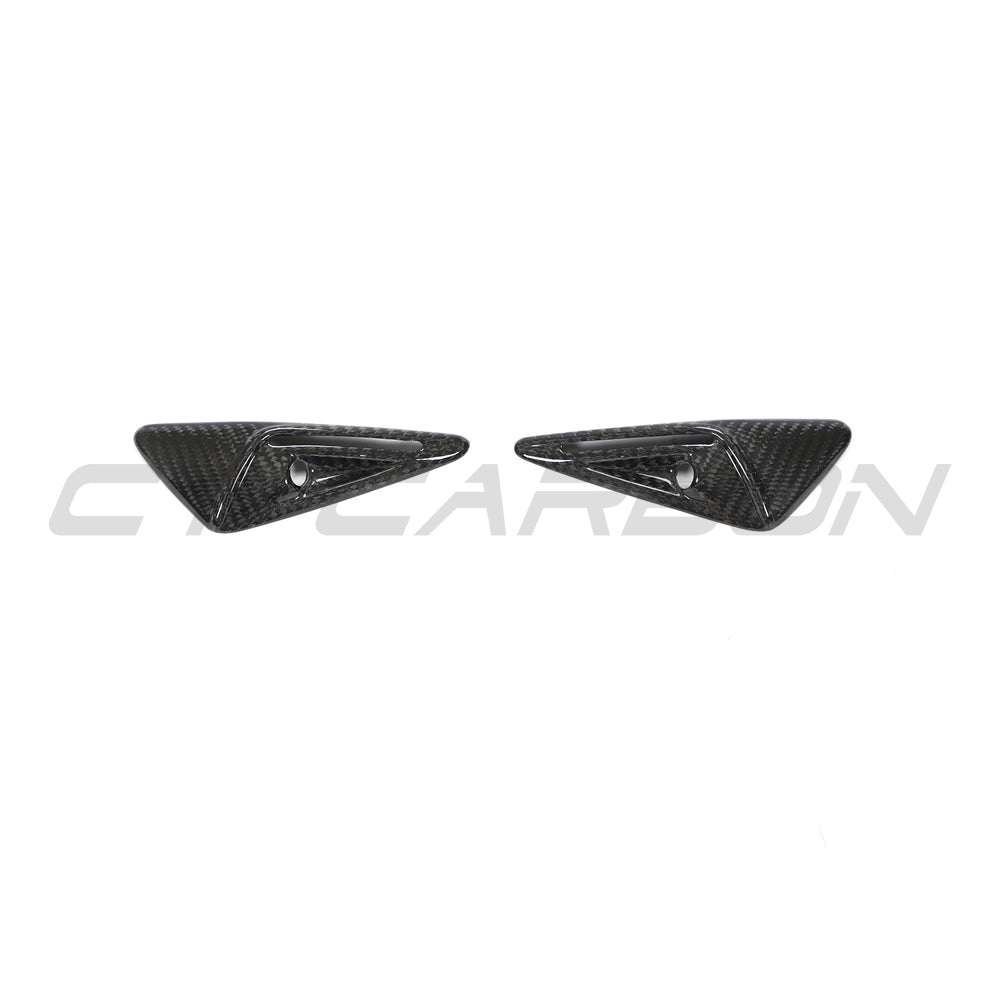 Tesla Model 3 2017-2023 carbon fiber side camera cover by CT Carbon, close-up view of sleek, lightweight accessory for car enhancement.