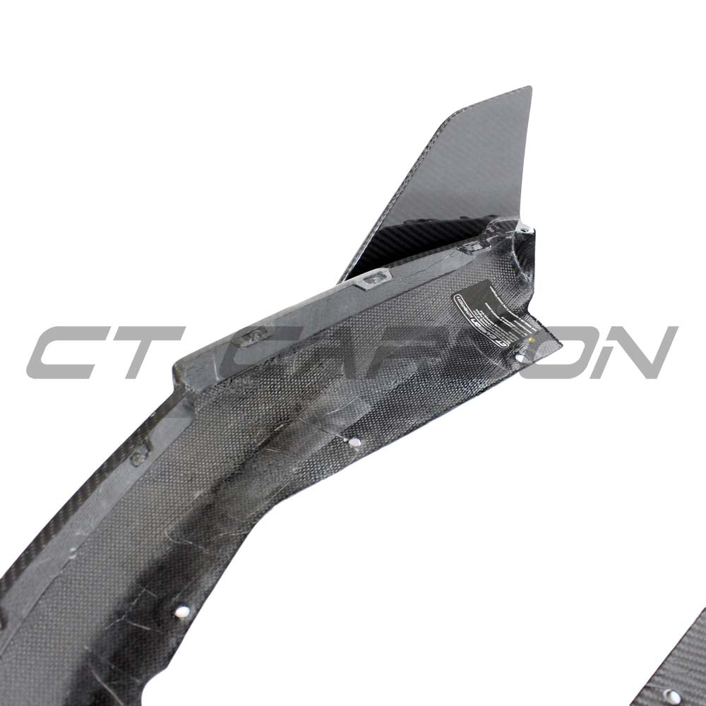 BMW G82 M4 full carbon fiber kit by CT Carbon, including front splitter, side skirts, and rear diffuser on a sports car.