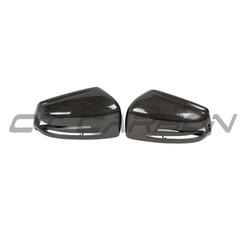 CT Carbon carbon fibre side mirror covers for Mercedes C and E Class W204 W212 cars, featuring a sleek carbon fiber finish.