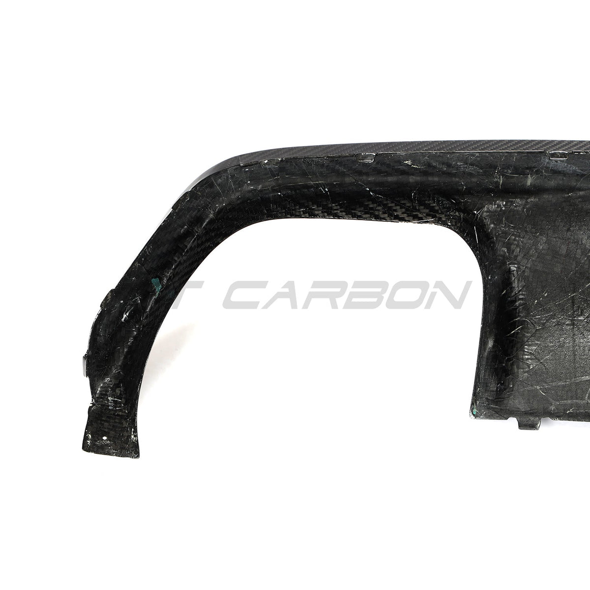 BMW M8 F93 Gran Coupe carbon fiber diffuser by CT Carbon, showing sleek, aerodynamic design with detailed carbon fiber texture.