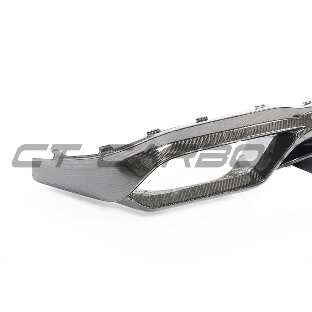 Mercedes E63 W213 2018-2020 pre-facelift carbon fibre diffuser by CT Carbon, showcasing sleek design and textured finish.