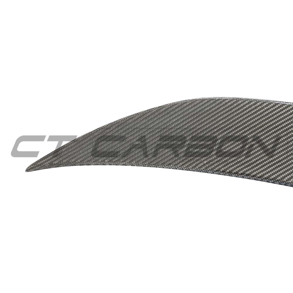 Mercedes E63 W213 2018-2020 pre-facelift carbon fibre spoiler by CT Carbon, shown on the rear of the vehicle.