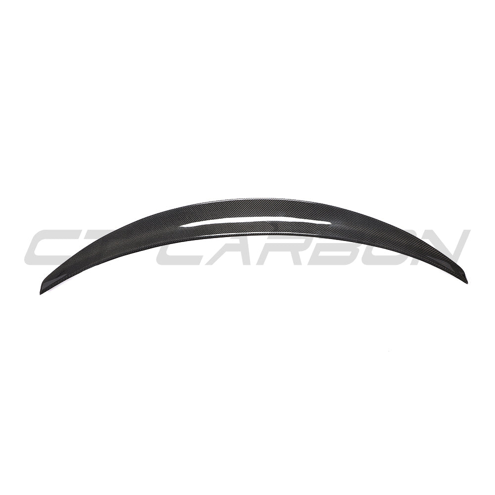 Tesla Model 3 2017-2023 CT Carbon V4 carbon fibre spoiler installed on the rear of the vehicle.