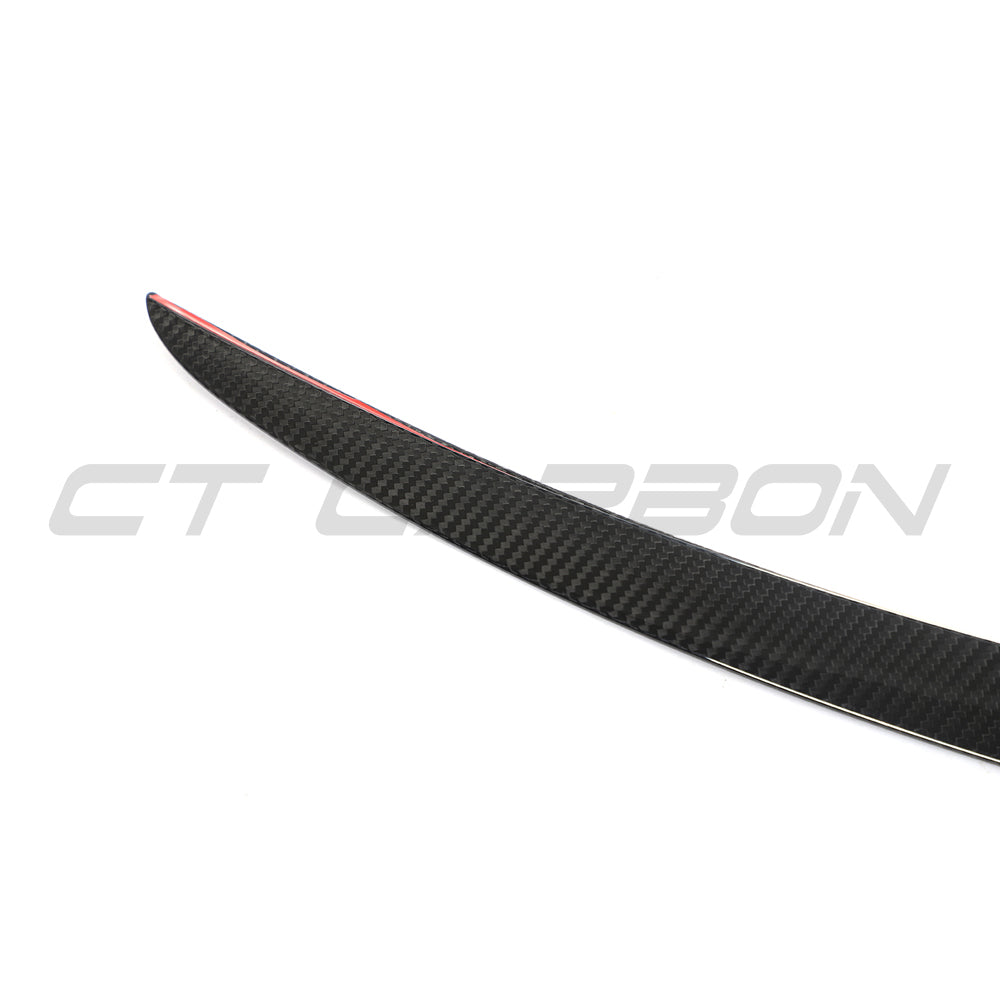 Tesla Model S 2012-2016 carbon fiber spoiler by CT Carbon, V1, showing the sleek aerodynamic design on the car.