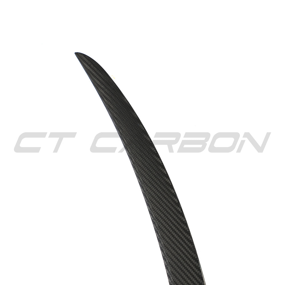 Tesla Model S 2012-2016 CT Carbon V1 carbon fiber spoiler installed on the car, showcasing sleek aerodynamic design.