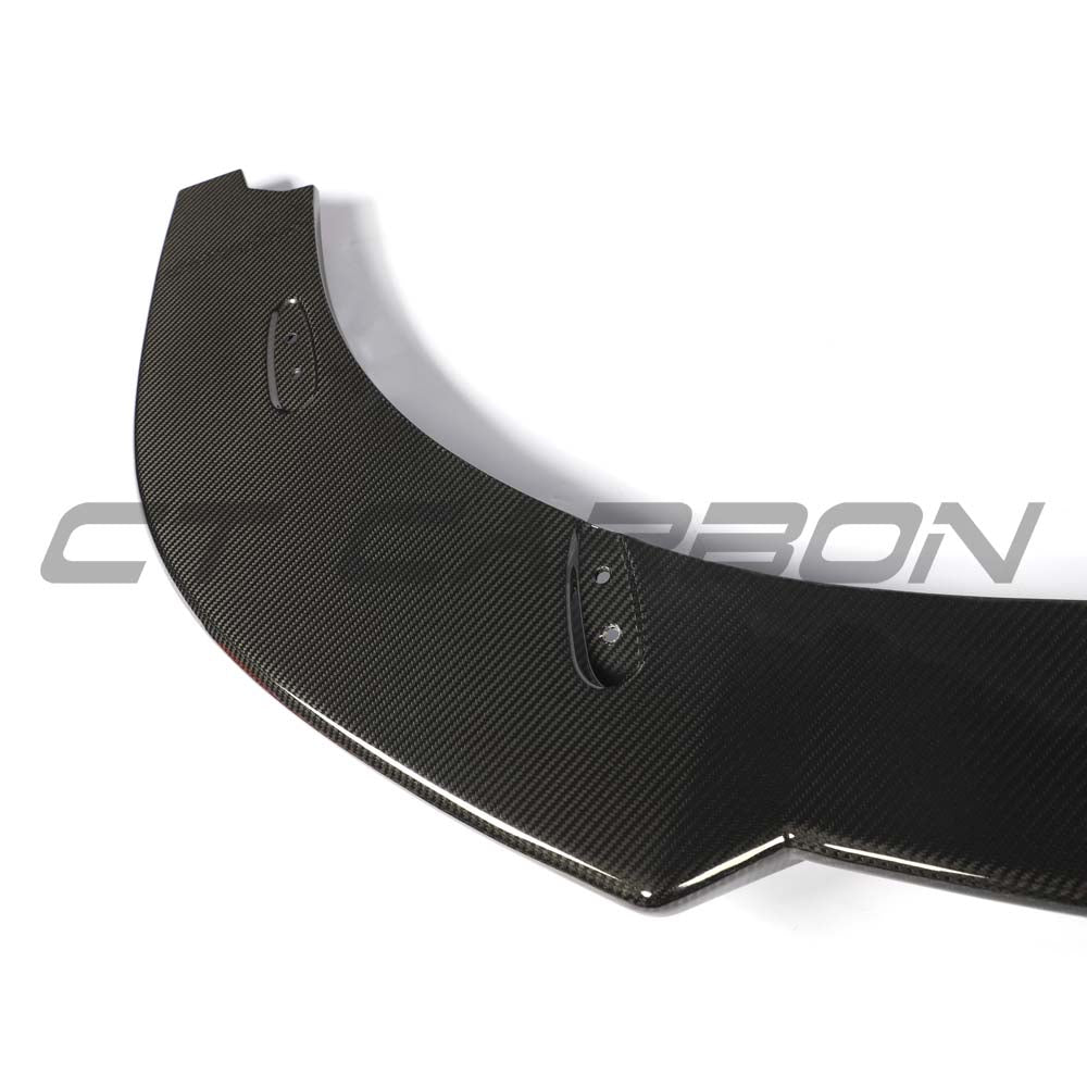 CT Carbon McLaren 750S 2023 carbon fibre splitter installed on the front of the sports car, showcasing sleek aerodynamic design.