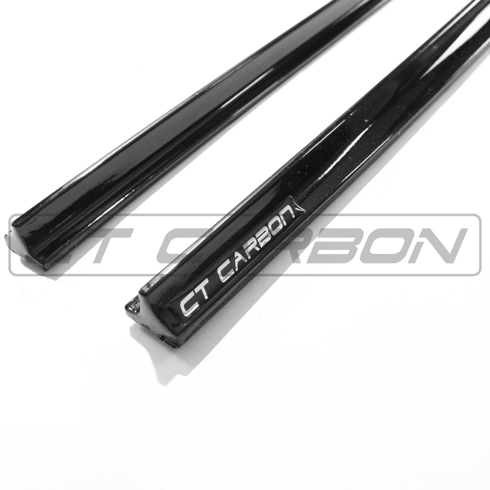 Volkswagen Polo MK5 2014-2017 CT Carbon gloss black side skirts installed on the vehicle, enhancing sporty appearance.