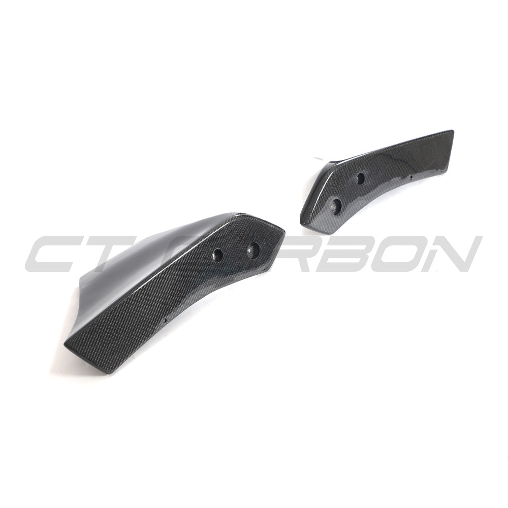 Carbon fiber front bumper corners for Toyota Supra 2019+ A90 by CT Carbon, showing detailed close-up of sleek automotive accessories.