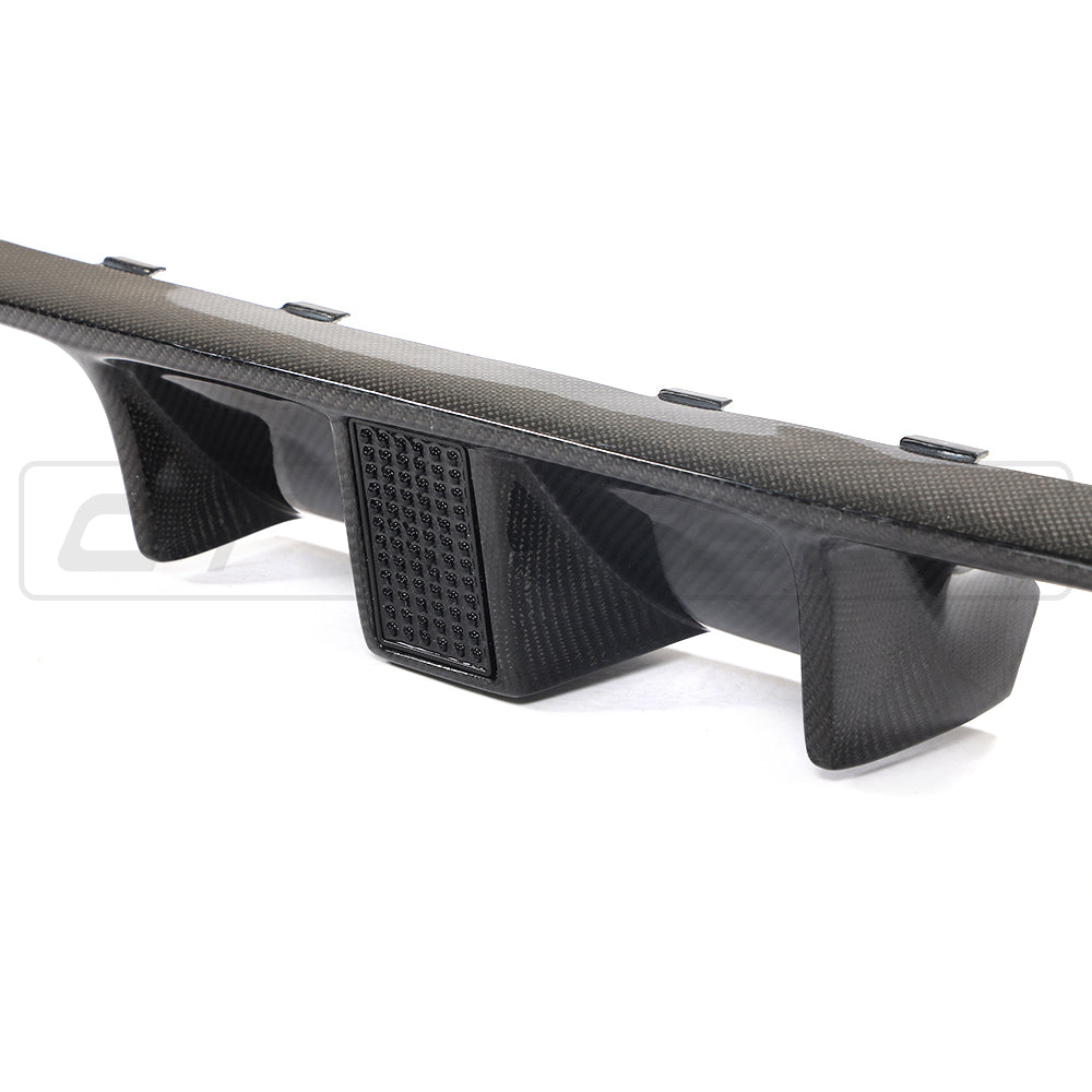 BMW M4 F83 convertible full carbon fibre kit by CT Carbon, showing close-up of carbon fiber components on the car.