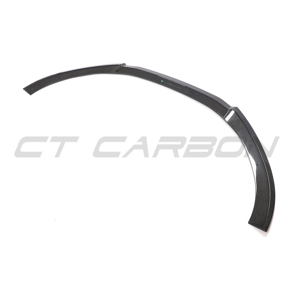 CT Carbon Audi RS6 C7/C7.5 carbon fiber splitter installed on front bumper, enhancing sporty look and aerodynamics.