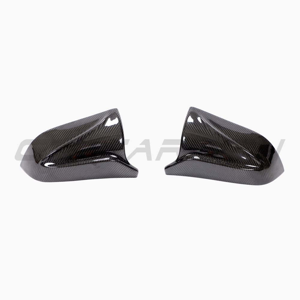 Tesla Model 3 2017+ carbon fiber mirror covers by CT Carbon, V2 accessory, showing sleek, lightweight carbon fiber finish.