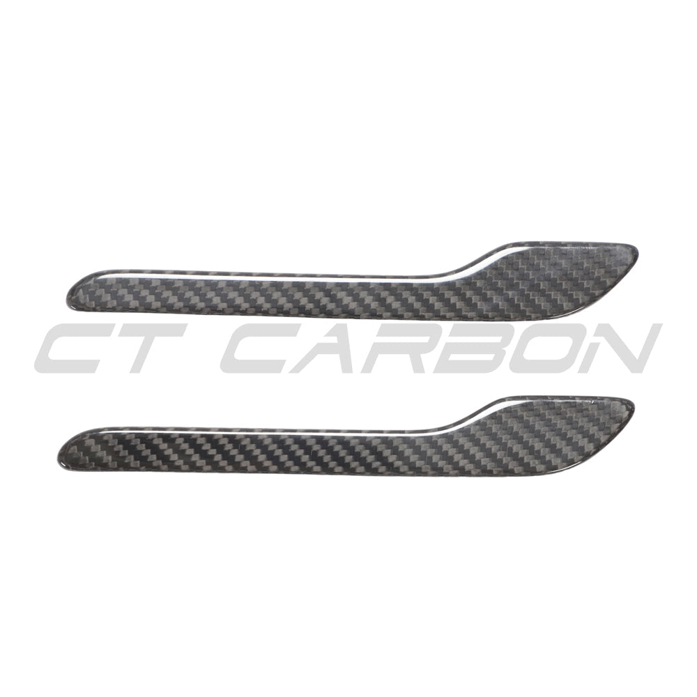 Tesla Model 3 and Y carbon fiber handle covers by CT Carbon, showing sleek, textured black accents on vehicle door handles.